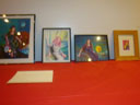 photo of table showing various art work by the members of Disabled In Action