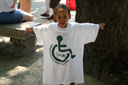 photo of a kid wearing an ICS T-shirt